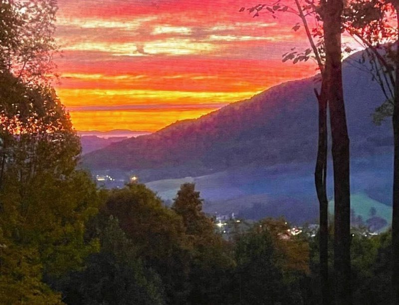 Spectacular sunset over mountains from Town View Estates